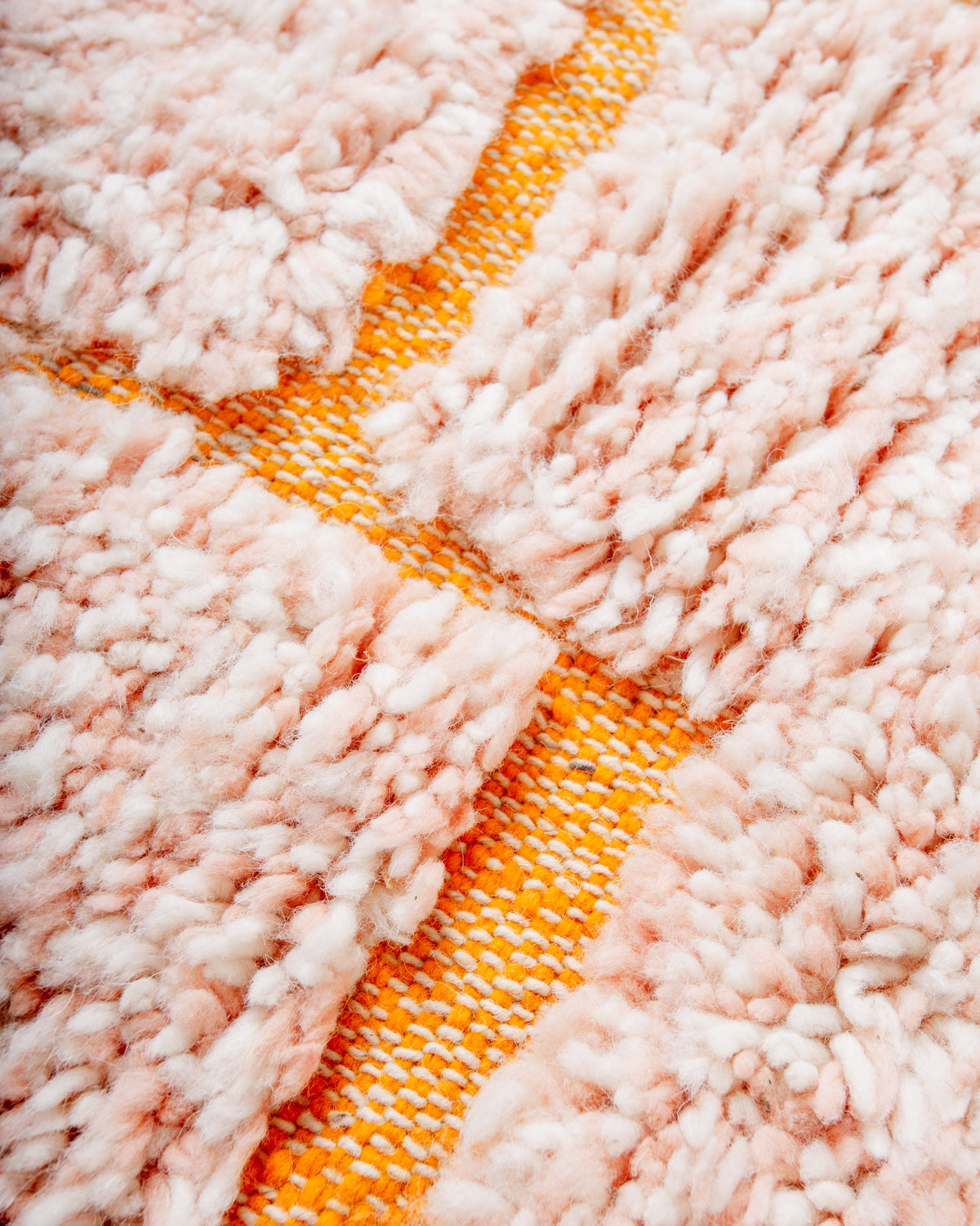 Modern, designer, handcrafted Berber rug from Morocco. Beniourain carpet with beautiful colours and patterns and fluffy wool texture.